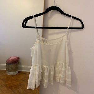 Frilly sheer white tank top